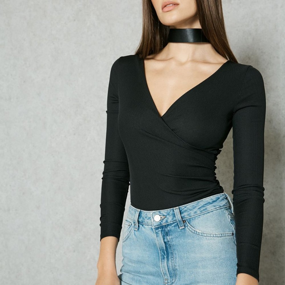 TOPSHOP Long Sleeved black ribbed body suit size 2